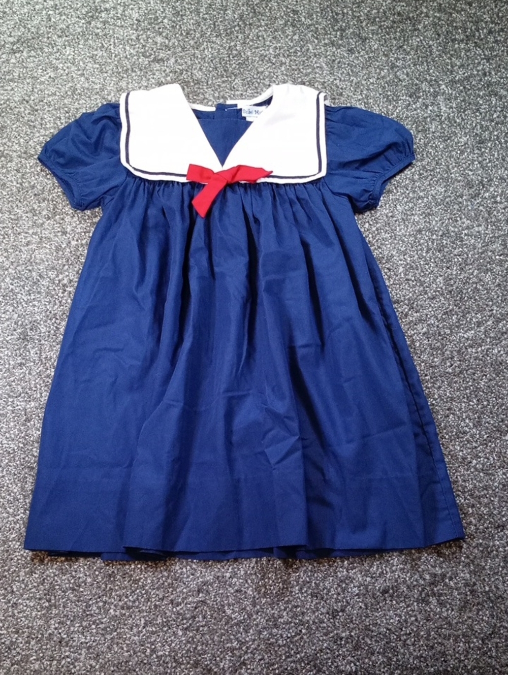 Mignon Navy and White Sailor-Trim Top with Red Bow Accent